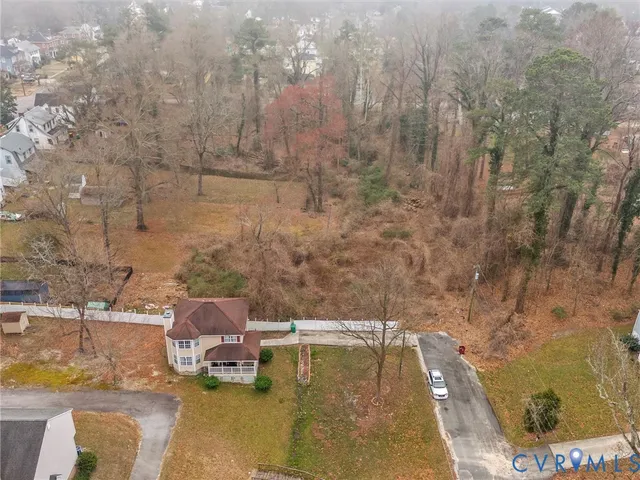 a view of bathroom with bathtub and shower