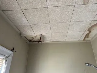 a view of a room with racks on the wall