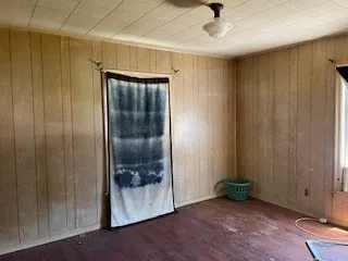 a view of entryway with wooden floor