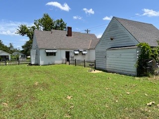 1217 East 27th Street Bryan, TX 77803 - Photo 7 of 27 a front view of a house with a garden and yard