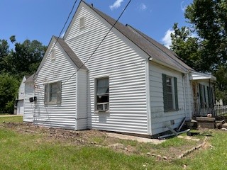 1217 East 27th Street Bryan, TX 77803 - Photo 8 of 27 a view of a house with a yard