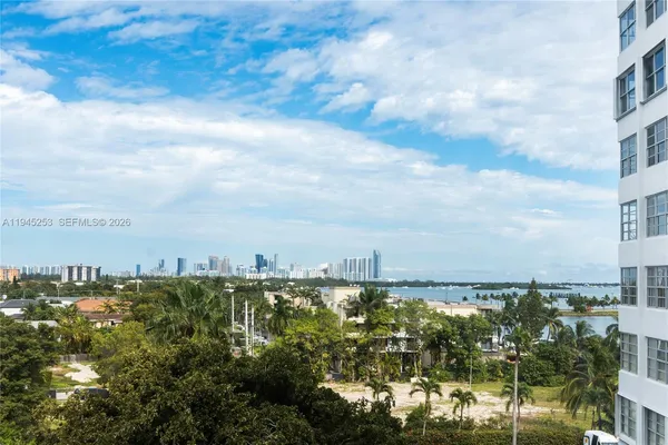 a view of a lake with a city