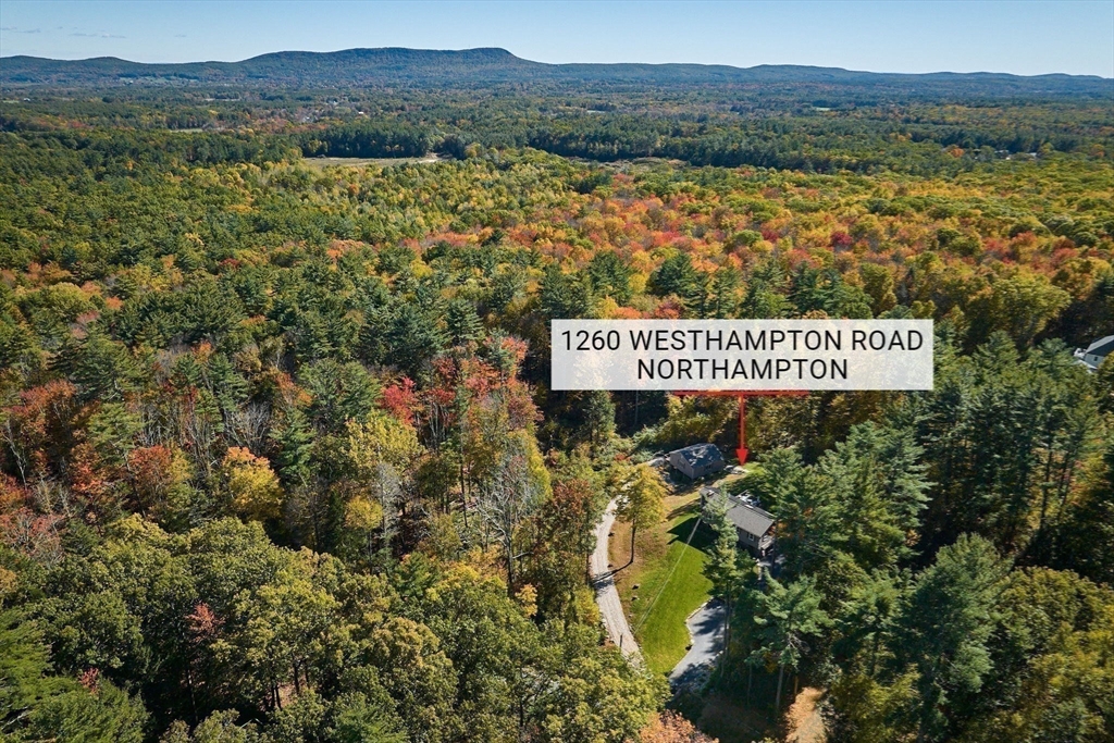 1260 Westhampton Road Northampton, MA 01062 - Photo 42 of 42 a view of a sign that is sitting in front of lake