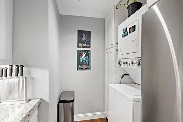 a hallway with washer and dryer