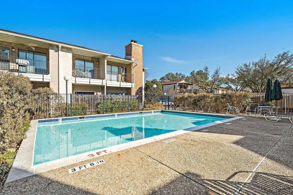 a view of a house with a swimming pool