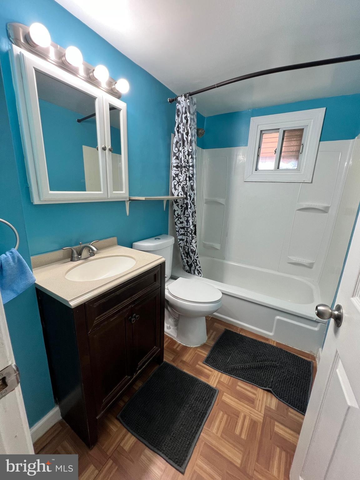 4440 Annapolis Road Halethorpe, MD 21227 - Photo 29 of 37 a bathroom with a sink and a mirror