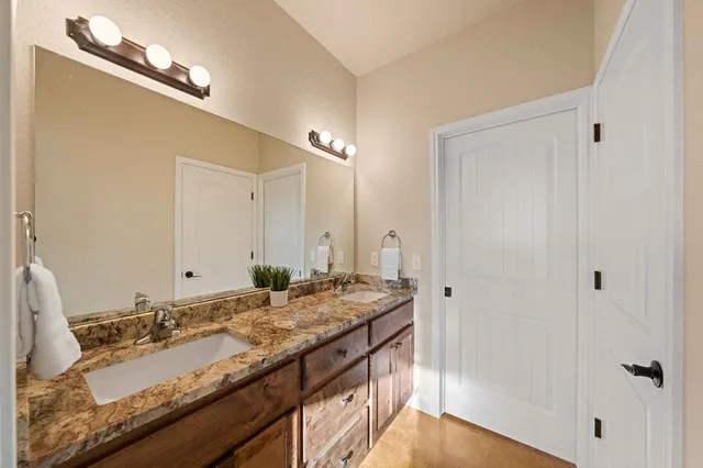 a bathroom with a bathtub and a toilet