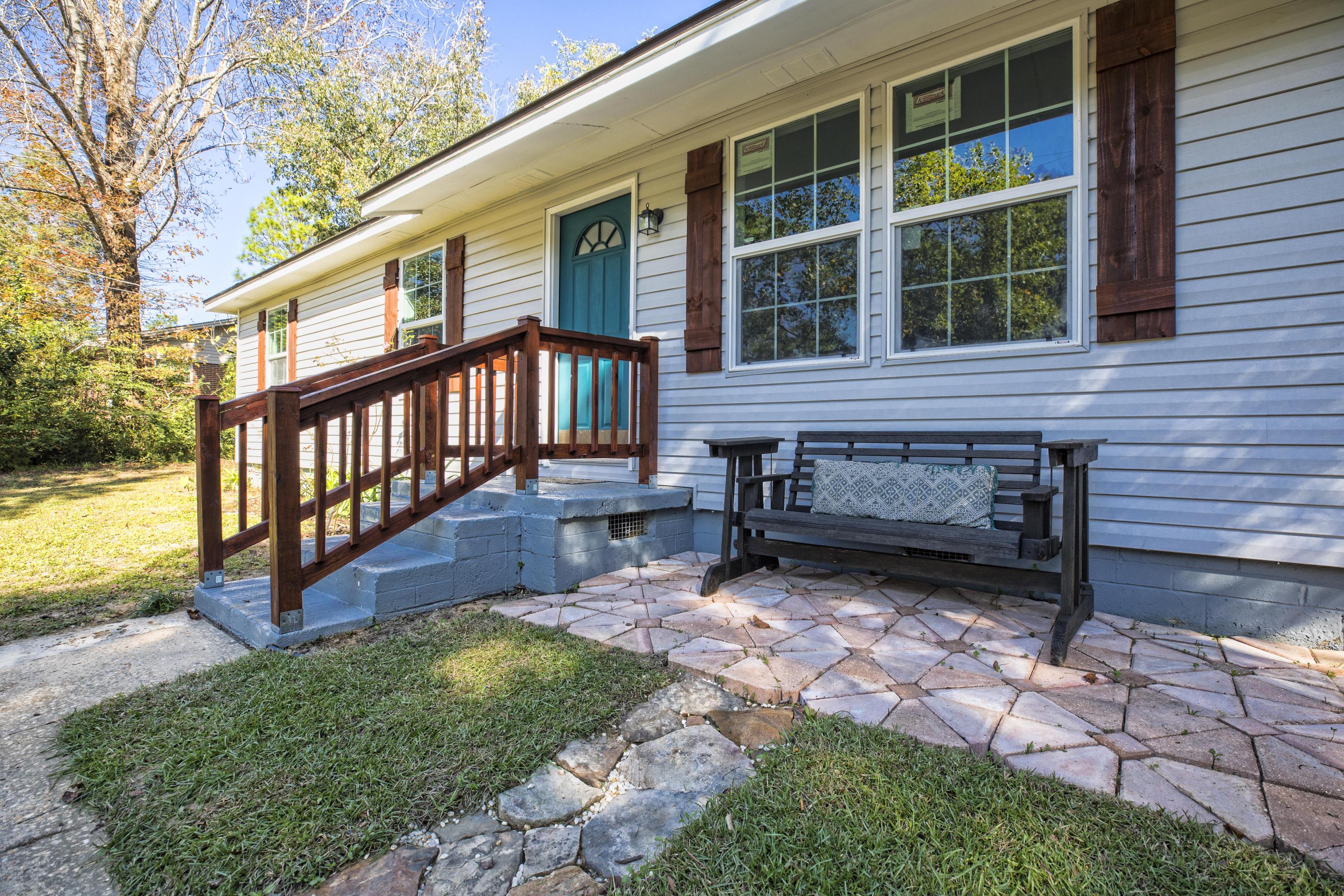 695 Ridge Lake Road Crestview, FL 32536 - Photo 1 of 27 a view of a house with backyard and sitting area