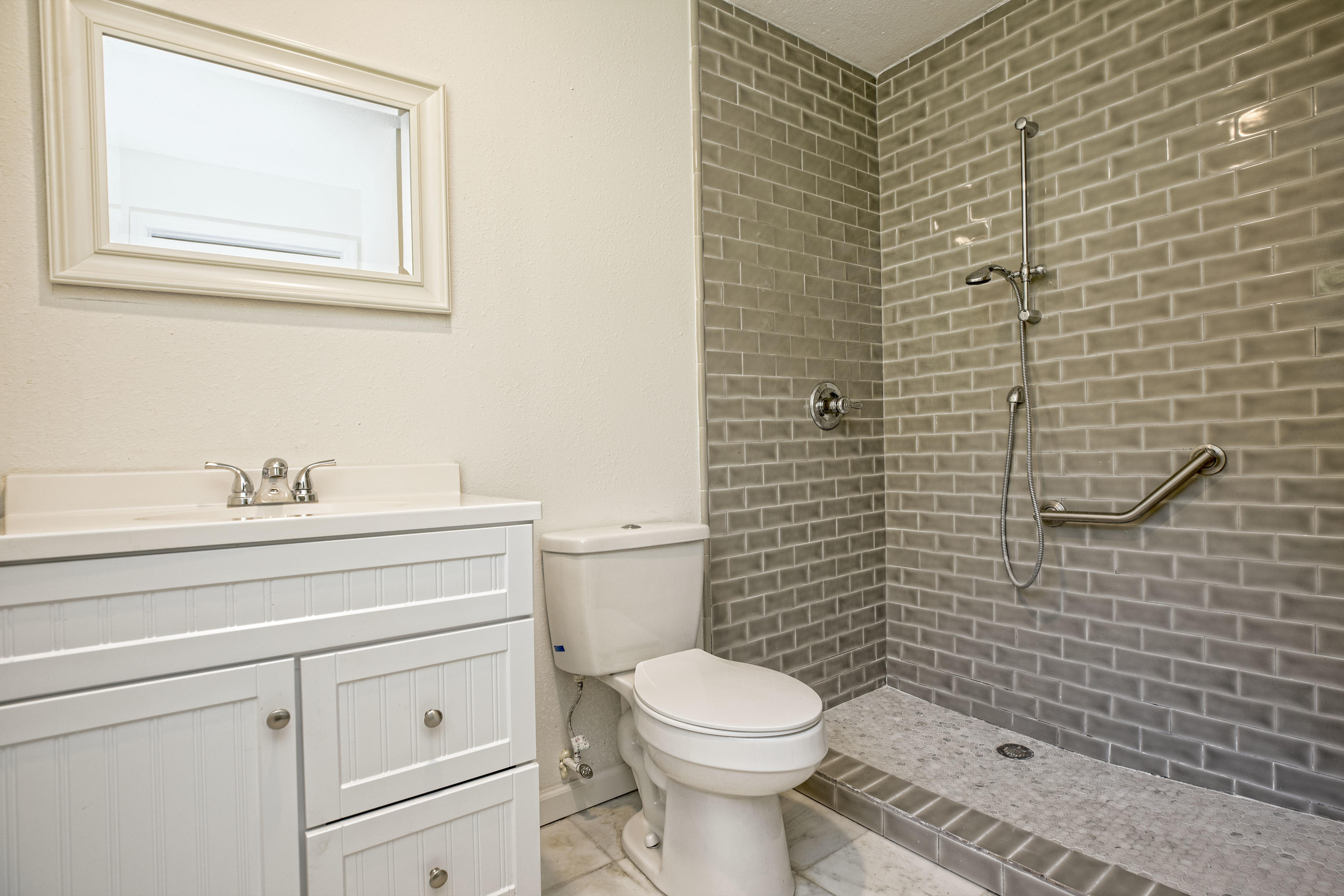 695 Ridge Lake Road Crestview, FL 32536 - Photo 18 of 27 a bathroom with a toilet and sink