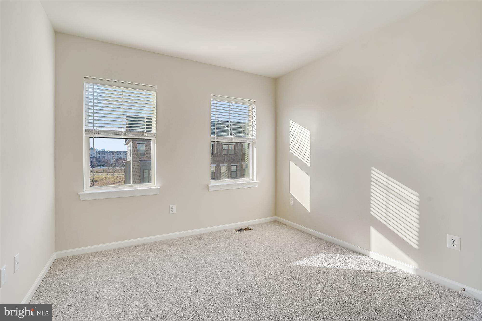 43341 Goshen Run Square Ashburn, VA 20148 - Photo 15 of 29 an empty room with windows