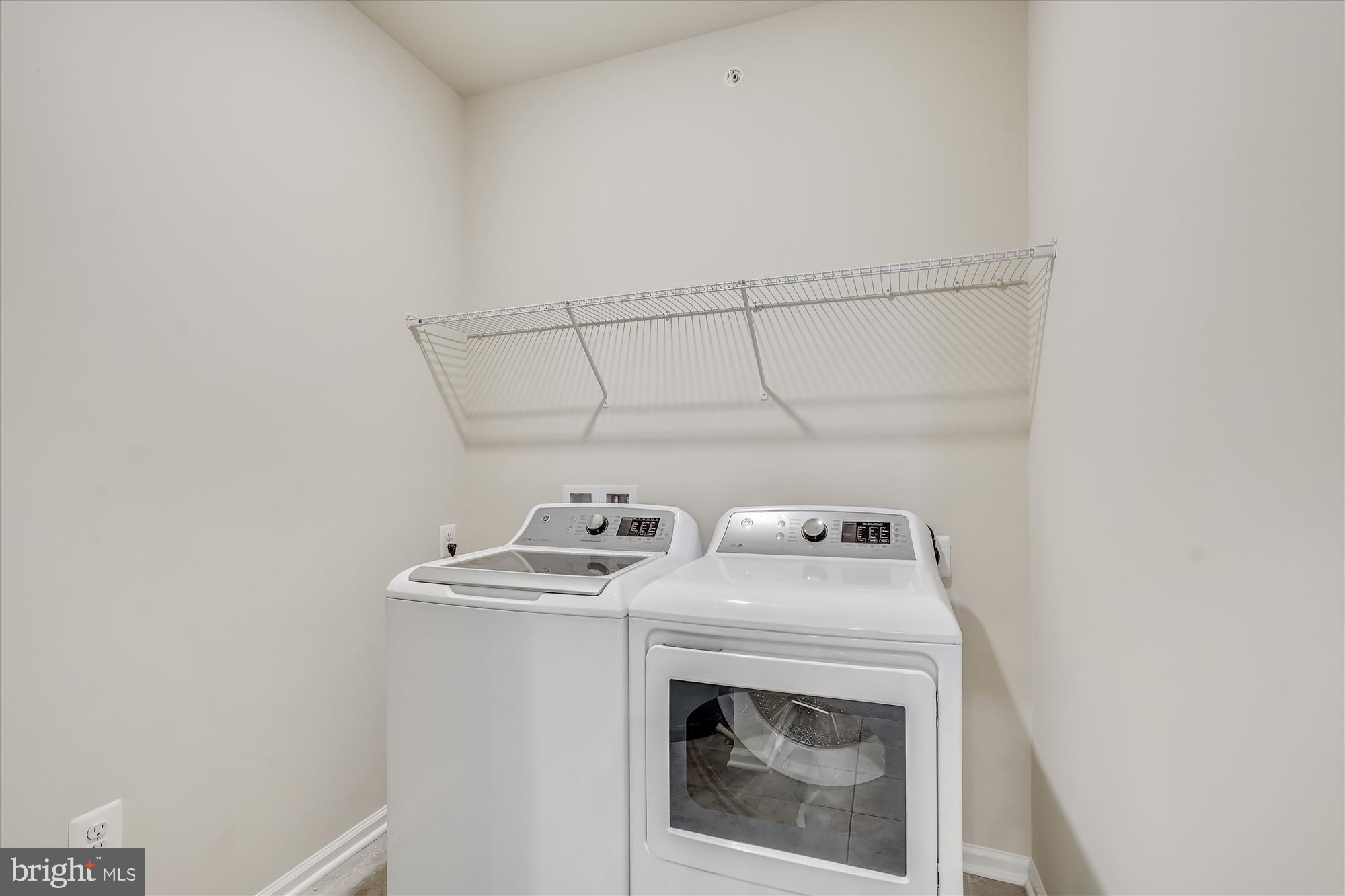 43341 Goshen Run Square Ashburn, VA 20148 - Photo 17 of 29 a utility room with dryer and washer