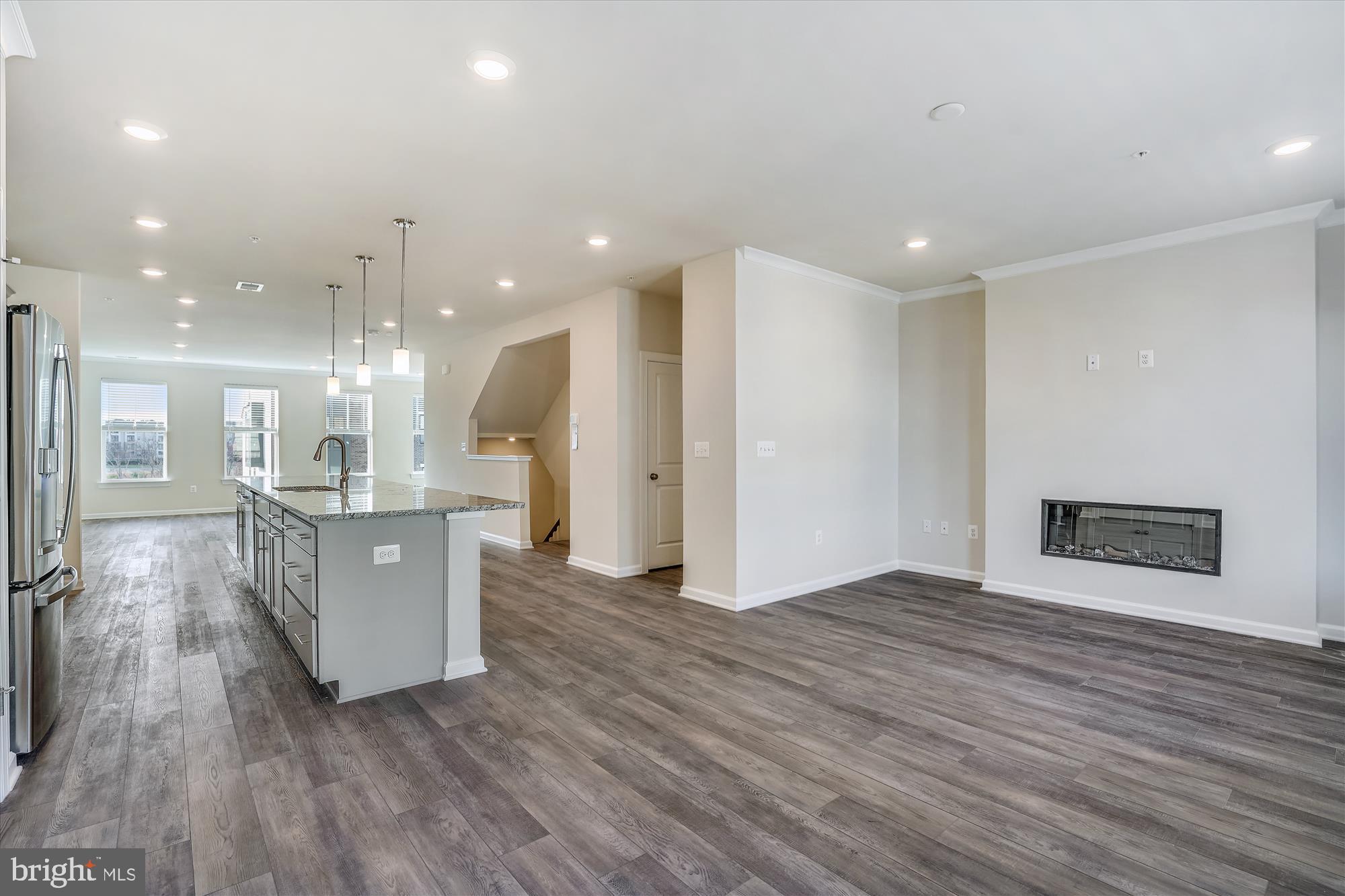 43341 Goshen Run Square Ashburn, VA 20148 - Photo 29 of 29 a view of kitchen and hall with wooden floor