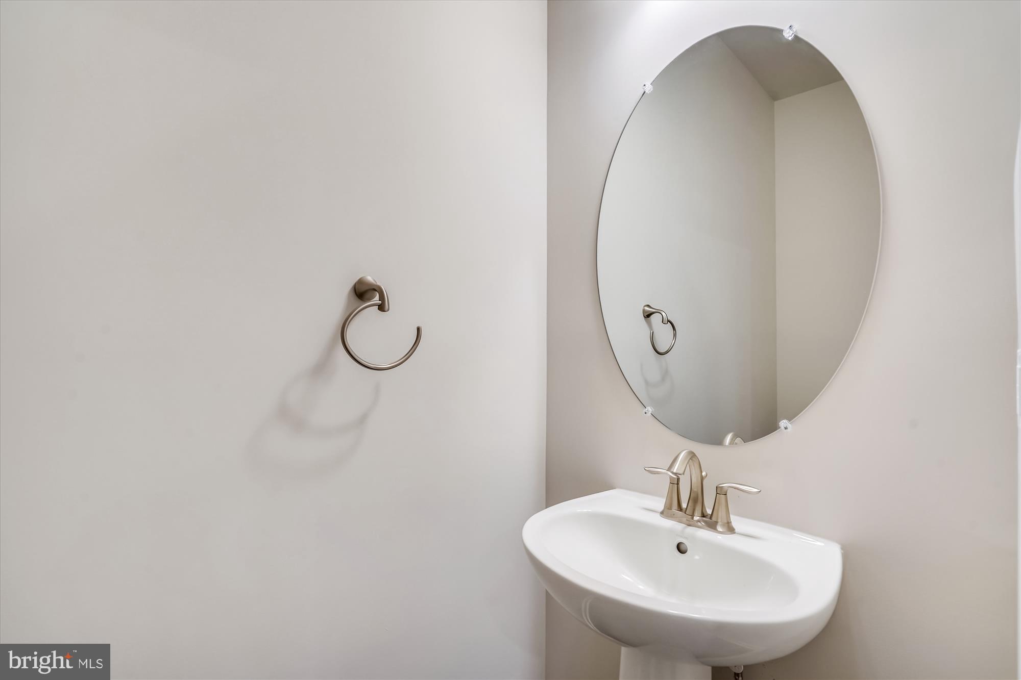 43341 Goshen Run Square Ashburn, VA 20148 - Photo 8 of 29 a bathroom with a sink and mirror