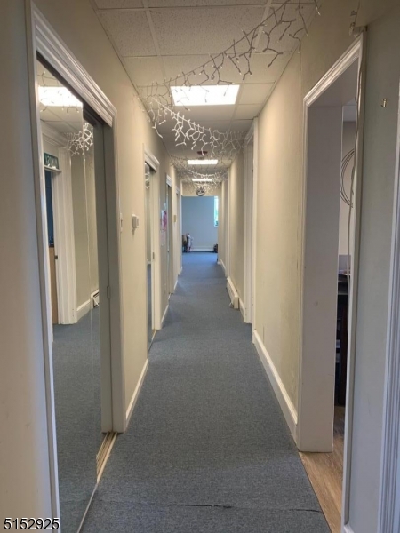 17 Waverly Place, Unit 9 Madison, NJ 07940 - Photo 15 of 15 a view of a hallway to a hallway