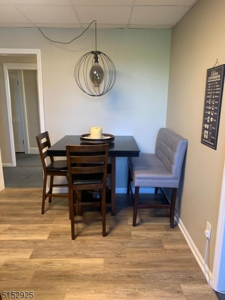 17 Waverly Place, Unit 9 Madison, NJ 07940 - Photo 5 of 15 a view of a dining room with furniture