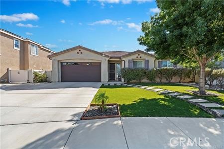 39366 11th Street West Palmdale, CA 93551 - Photo 13 of 15 a front view of a house with a yard
