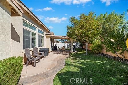 39366 11th Street West Palmdale, CA 93551 - Photo 4 of 15 a view of yard with patio