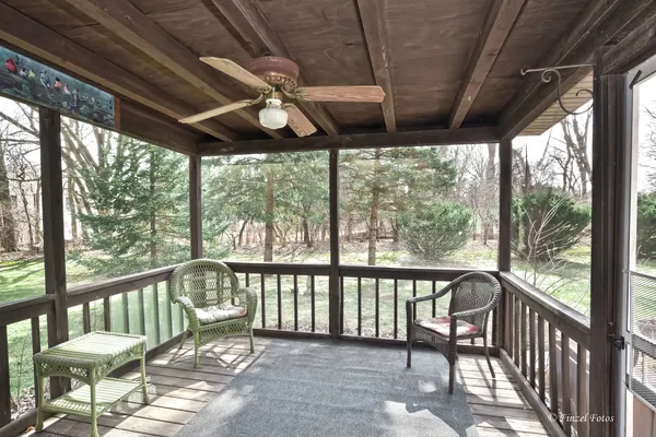 a view of a porch with furniture