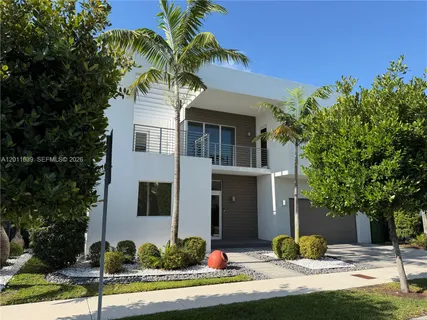 a front view of a house with yard