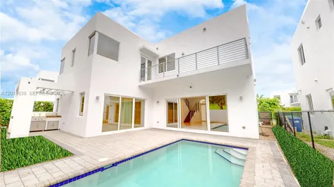 a view of a house with a swimming pool