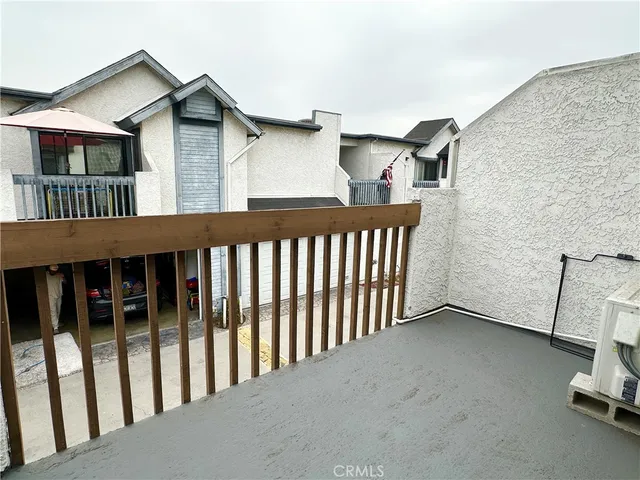 a view of a house with porch and wooden floor