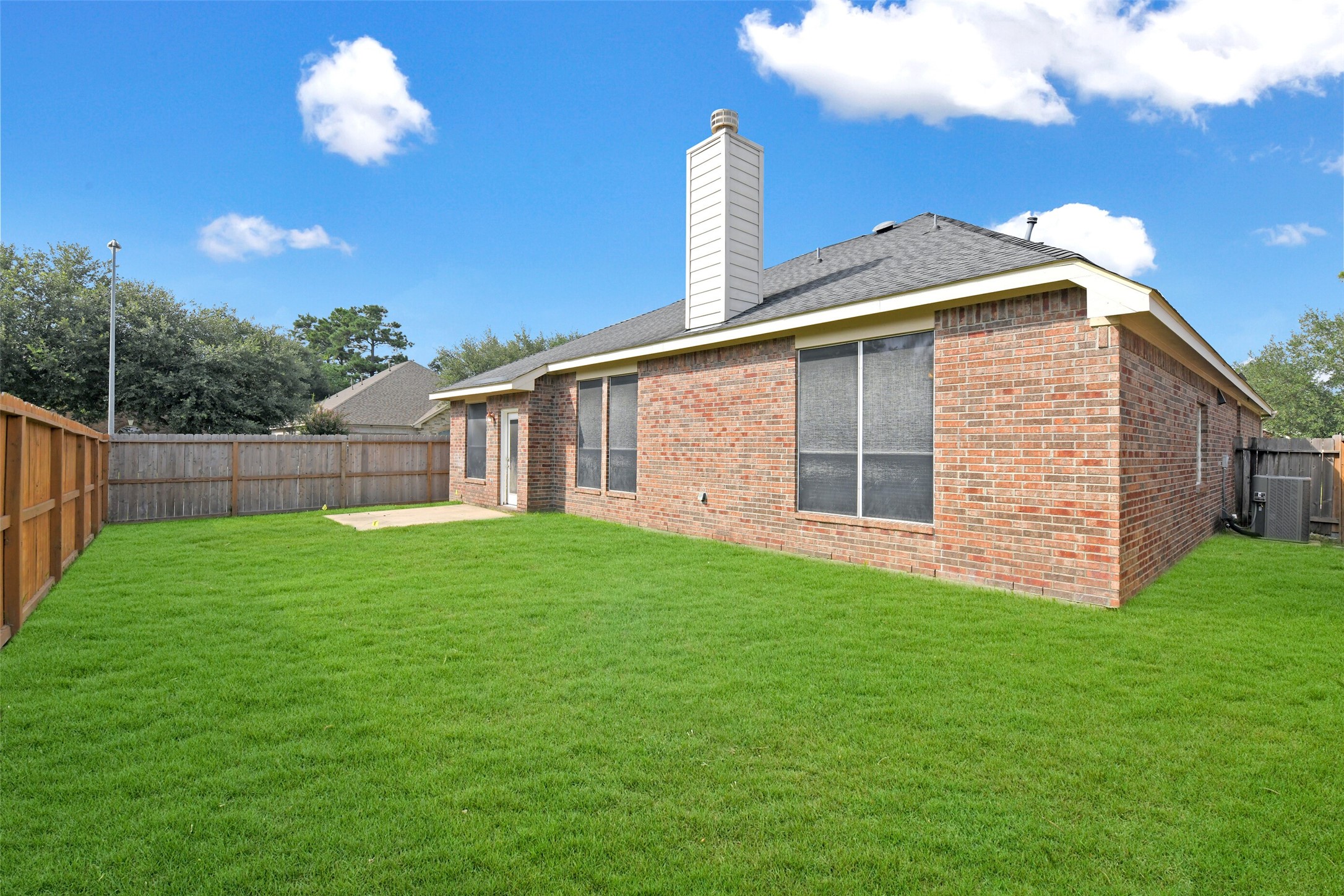 19227 Countryhills Court Spring, TX 77388 - Photo 29 of 33 This expansive backyard is perfect for relaxation and outdoor activities.