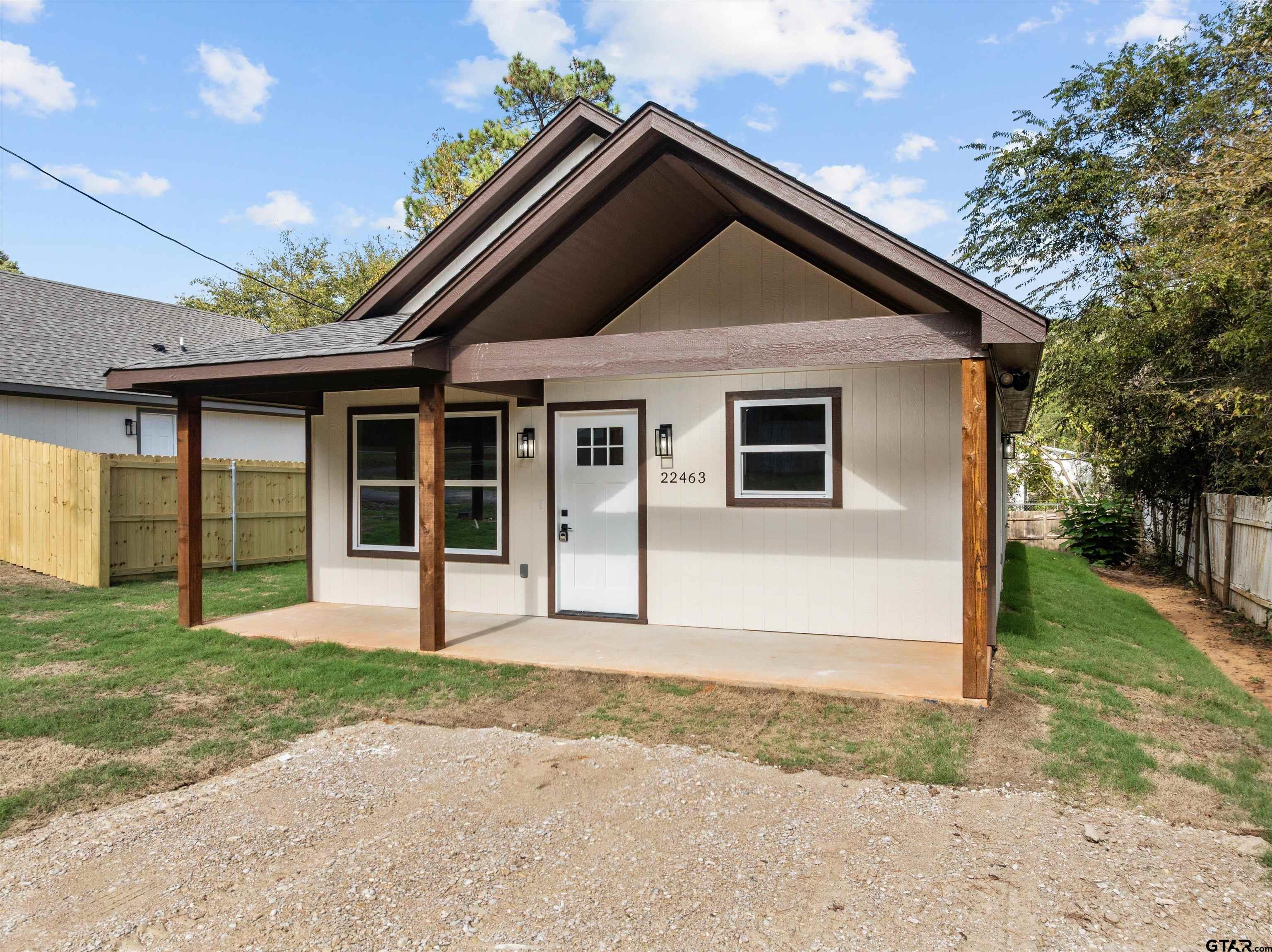 22463 Trailwood Road Flint, TX 75762 - Photo 14 of 17 a front view of a house with a yard
