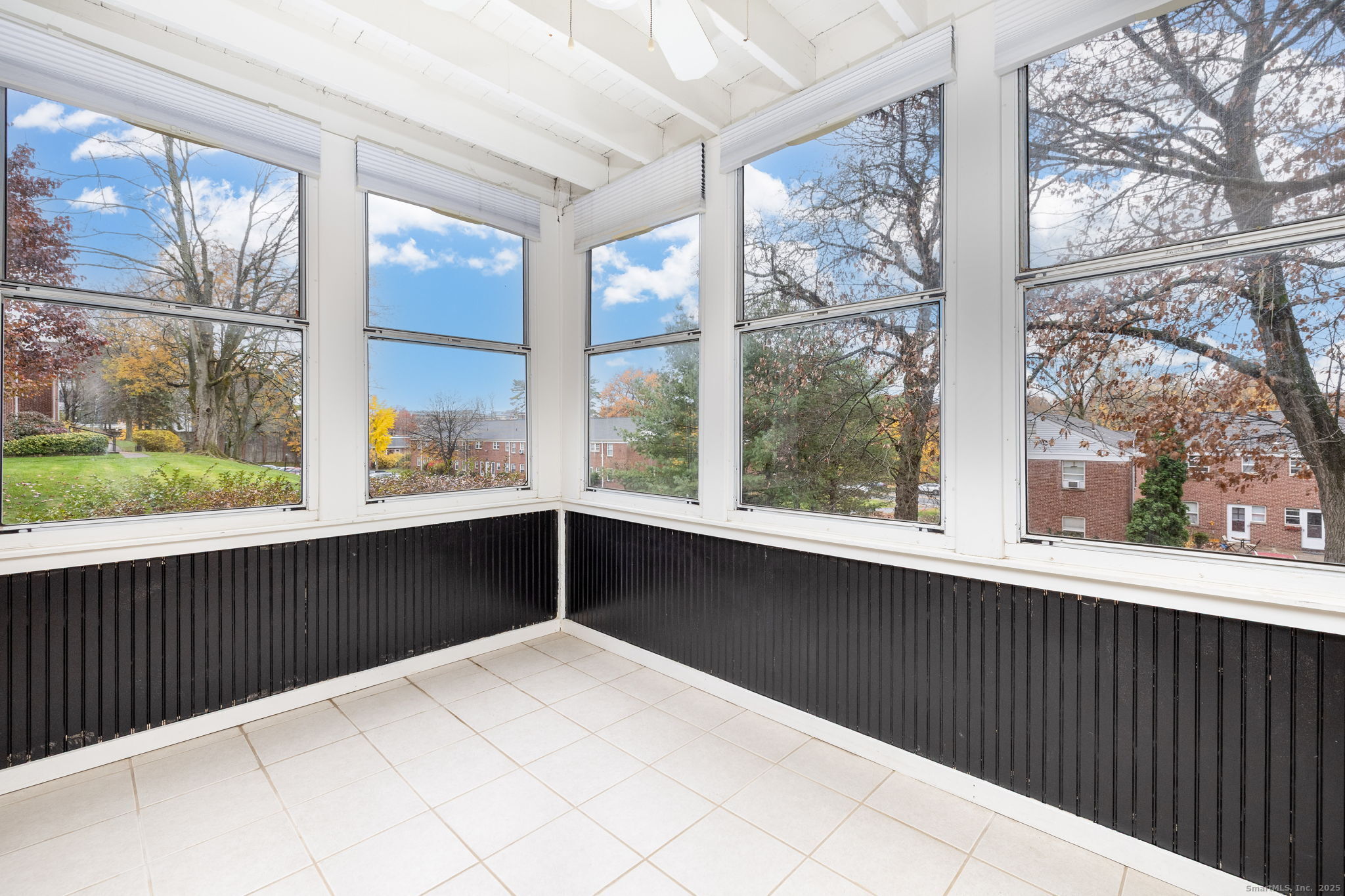 43 Arnold Way, Unit 43 West Hartford, CT 06119 - Photo 17 of 21 a view of a balcony with wooden floor