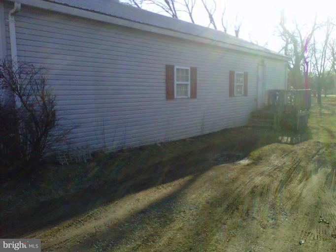 304 South Buchannan Street, Unit A B Ranson, WV 25438 - Photo 1 of 9 a view of a backyard
