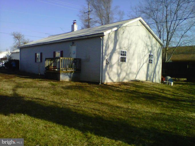 304 South Buchannan Street, Unit A B Ranson, WV 25438 - Photo 9 of 9 a view of a back yard of the house