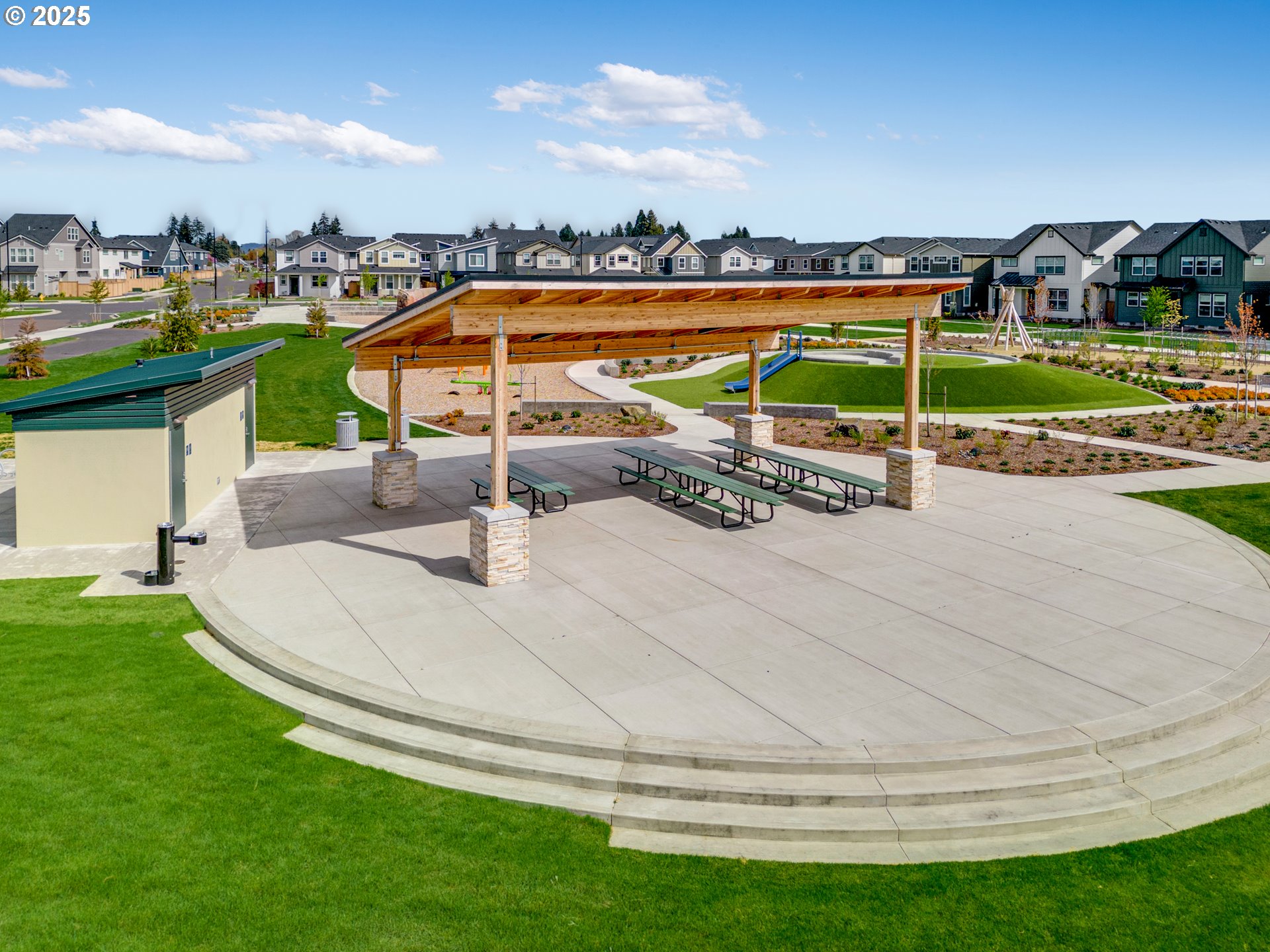 3365 Southwest 209th Avenue Hillsboro, OR 97123 - Photo 19 of 23 a view of a park with swings and slides