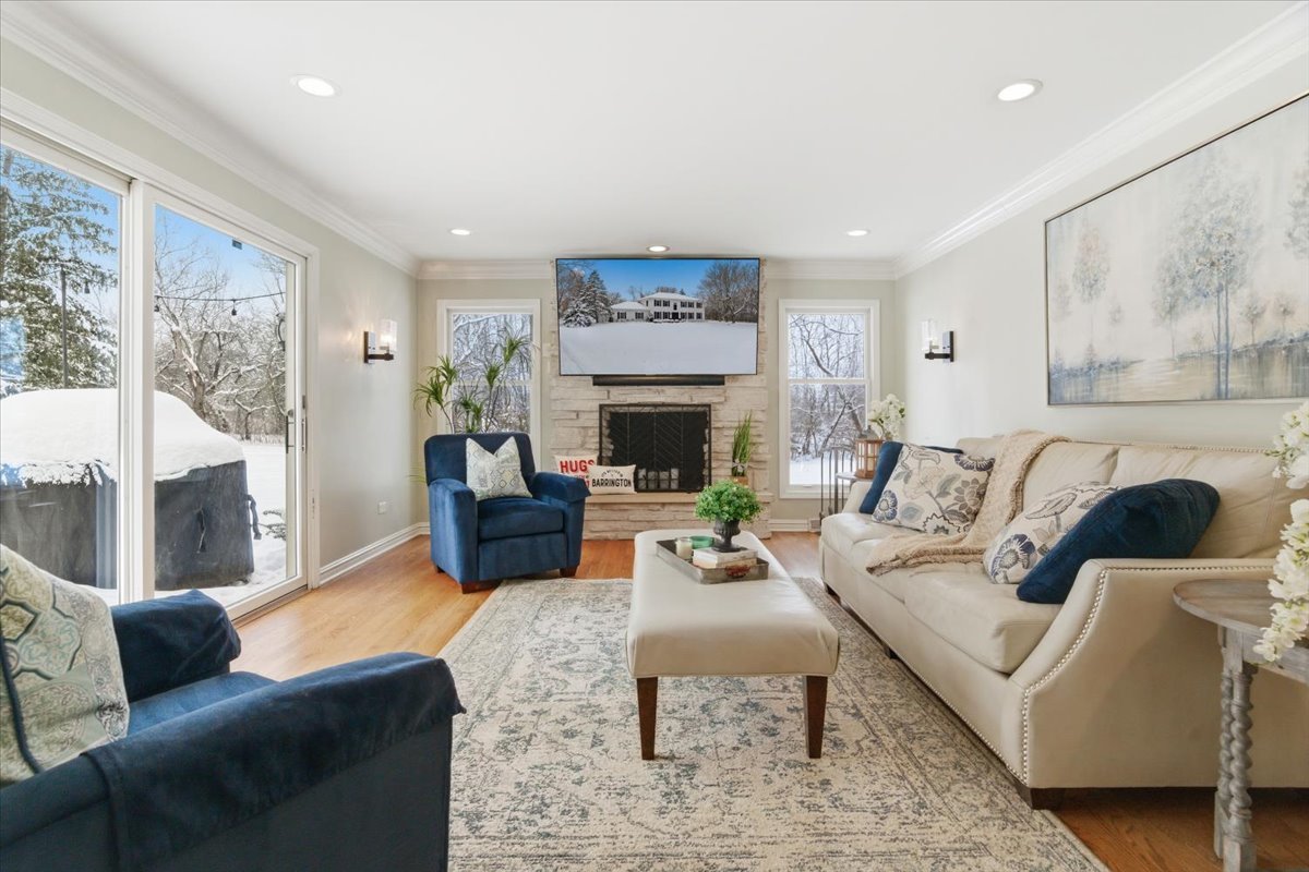 12 Crestview Lane Lake Barrington, IL 60010 - Photo 12 of 54 a living room with furniture fireplace and a large window