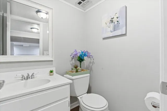 a view of a house with a snow in the yard