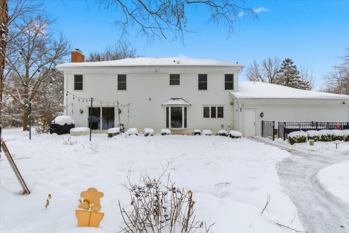 12 Crestview Lane Lake Barrington, IL 60010 - Photo 37 of 54 a view of a house with a snow in the yard