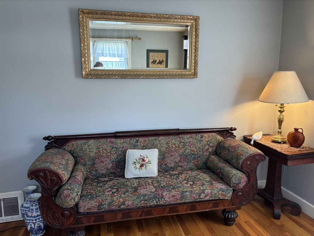 75 Powell Avenue Springfield, MA 01118 - Photo 14 of 25 a living room with furniture and a couch