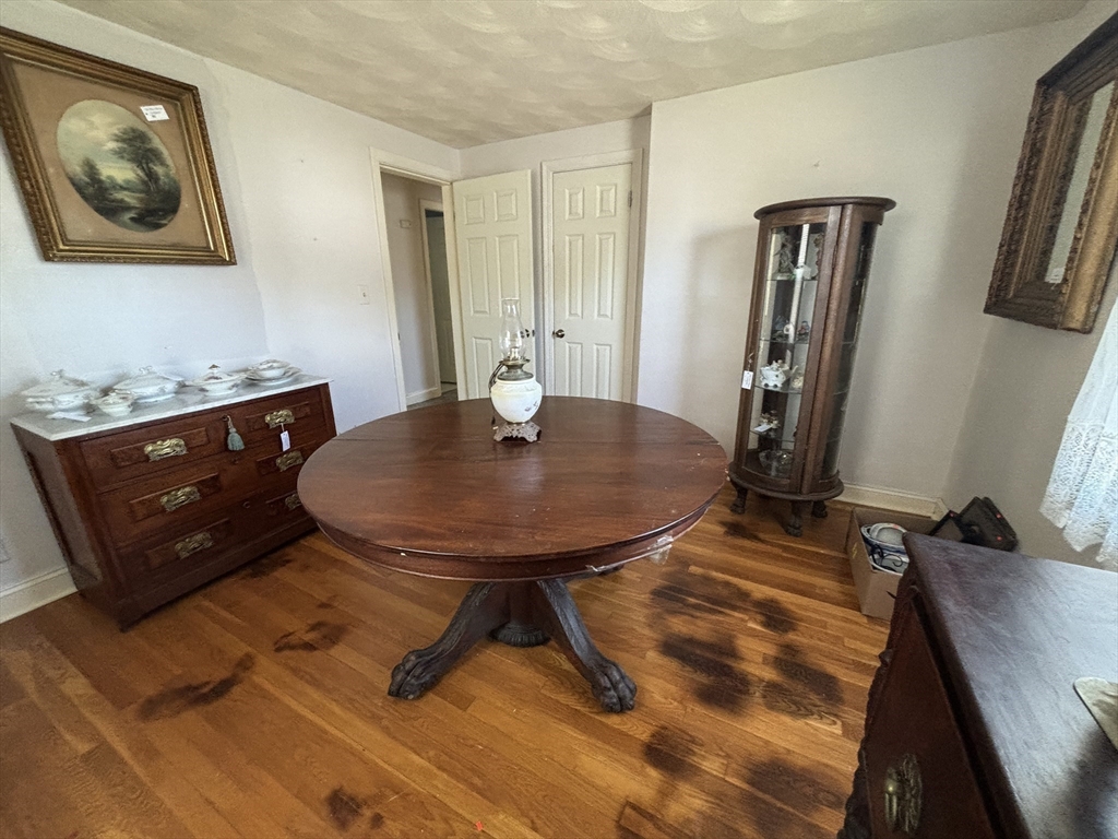 75 Powell Avenue Springfield, MA 01118 - Photo 15 of 25 a dining room with table and chair