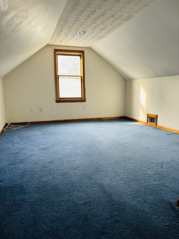 75 Powell Avenue Springfield, MA 01118 - Photo 19 of 25 an empty room with windows