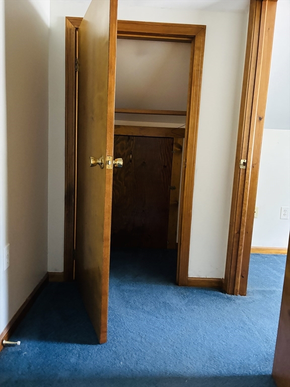 75 Powell Avenue Springfield, MA 01118 - Photo 20 of 25 a view of front door with wooden floor