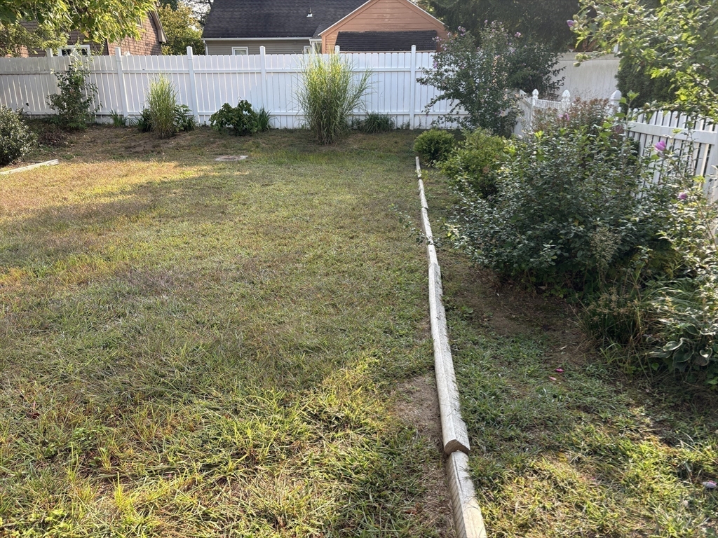 75 Powell Avenue Springfield, MA 01118 - Photo 3 of 25 a view of a backyard