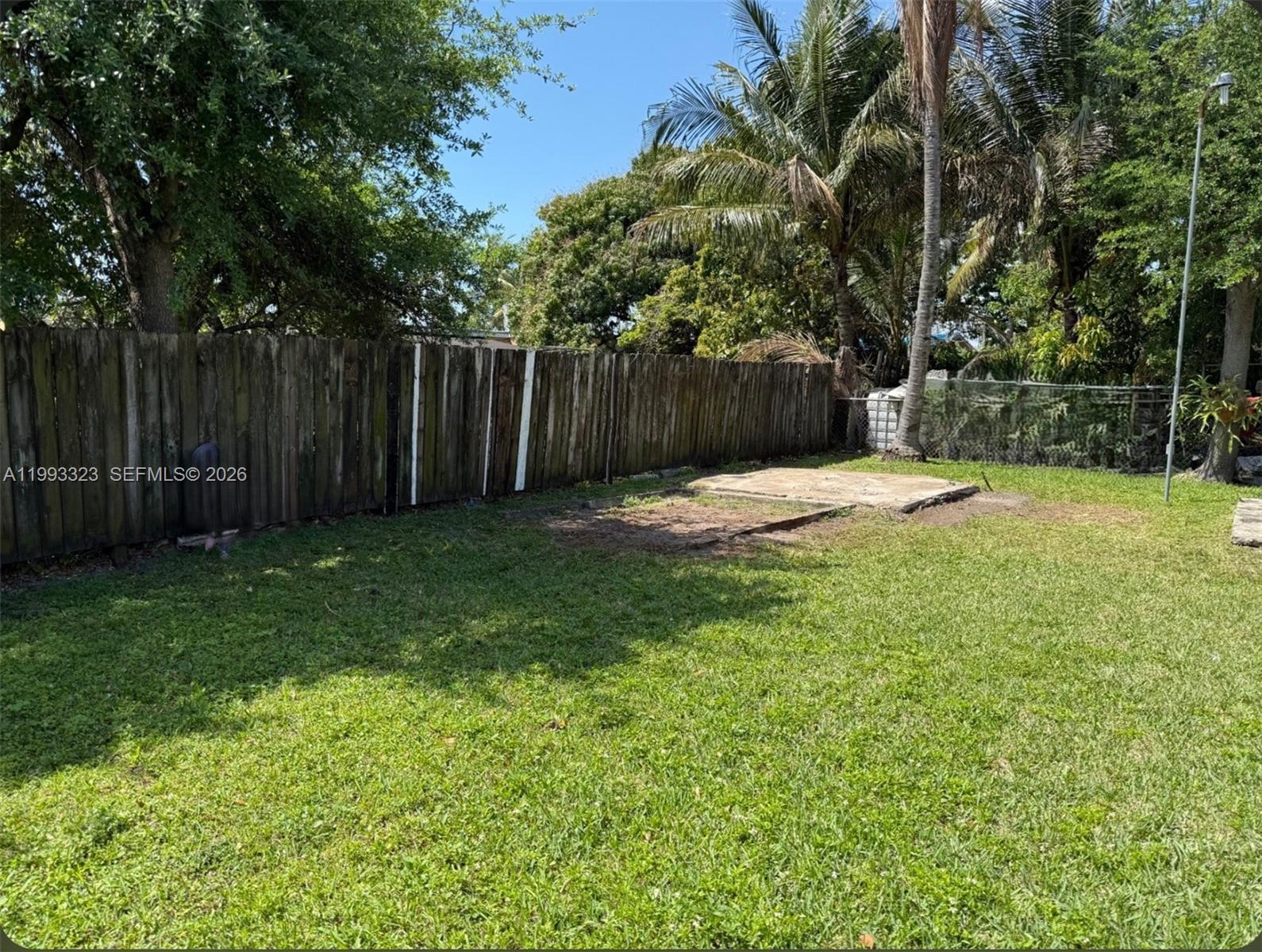 3066 Northwest 28th Street Miami, FL 33142 - Photo 5 of 6 a fire hydrant in the middle of a field