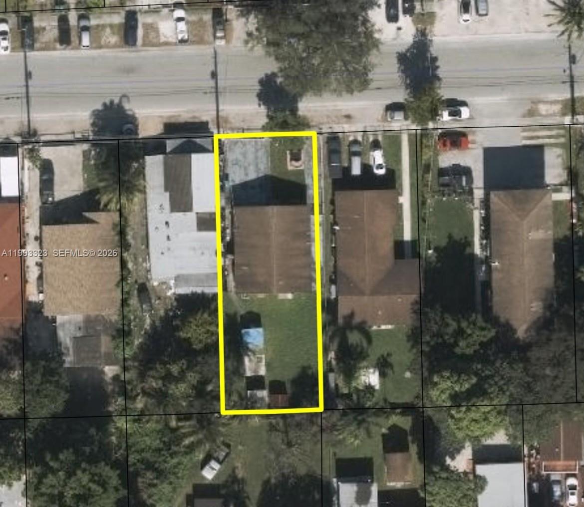 3066 Northwest 28th Street Miami, FL 33142 - Photo 6 of 6 an aerial view of multi story residential apartment building with yard