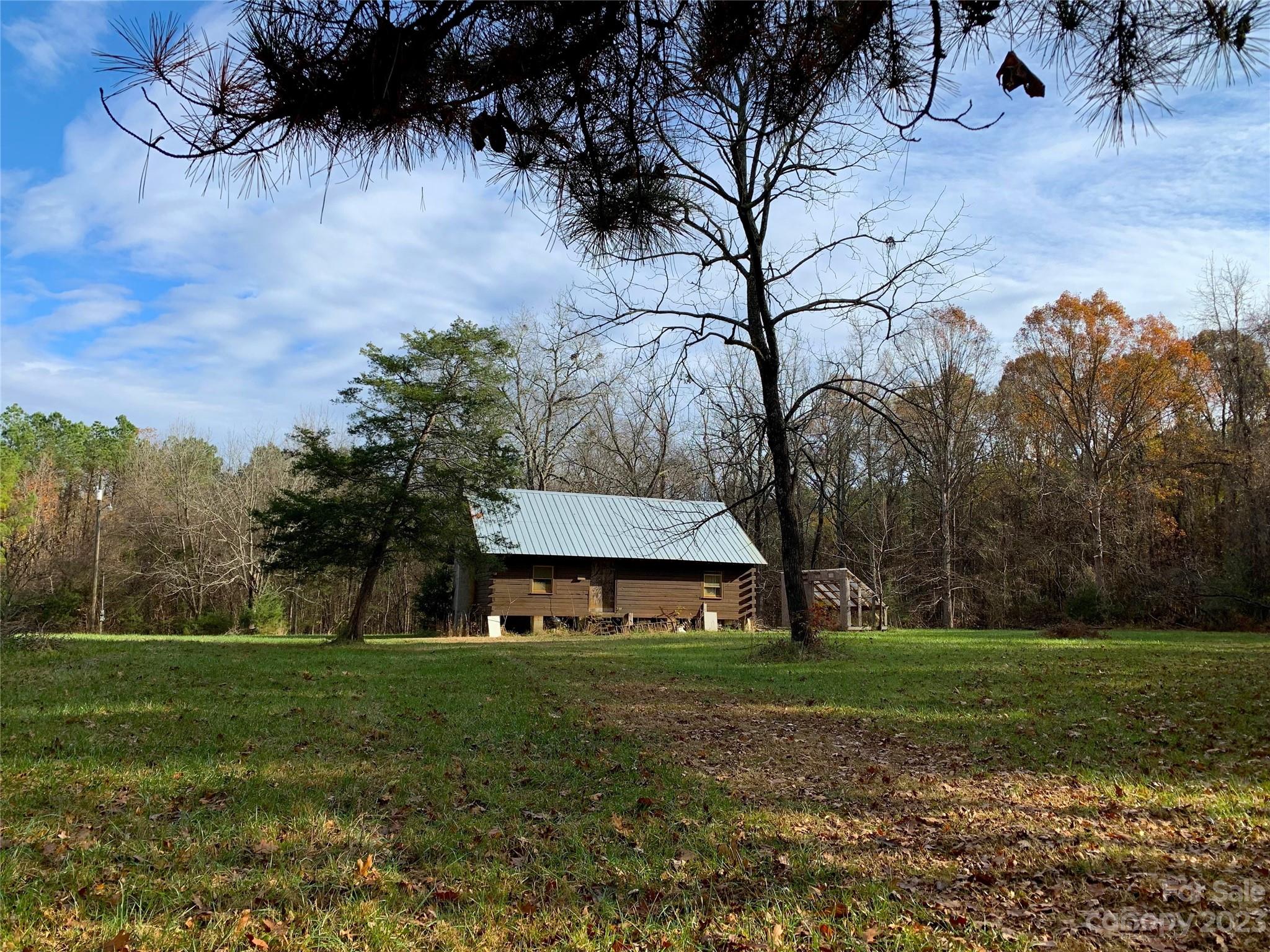 5120 Tabernacle Road Lancaster, SC 29720 - Photo 1 of 13 a front view of a house with garden