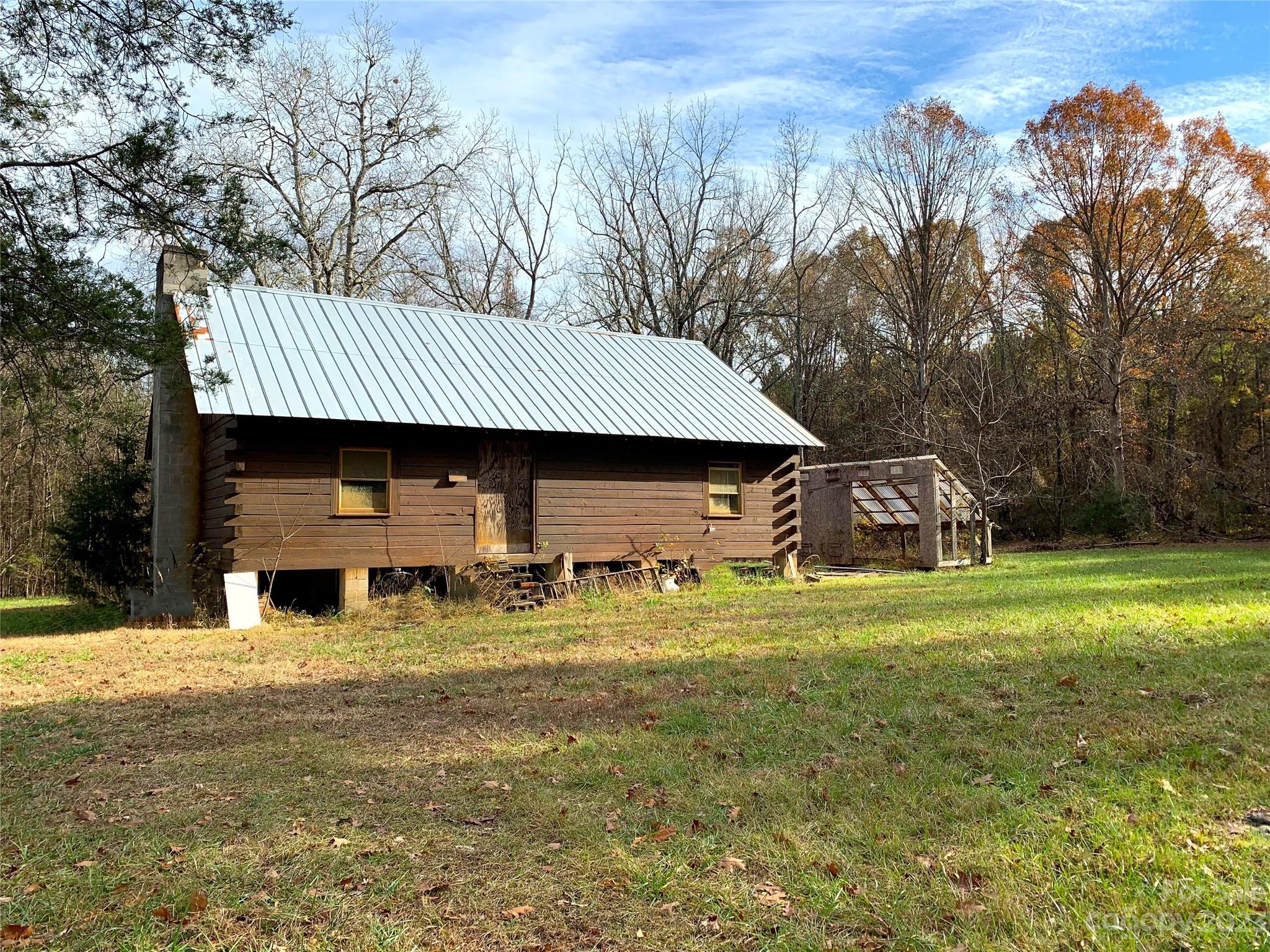 5120 Tabernacle Road Lancaster, SC 29720 - Photo 5 of 13 a front view of a house with a yard