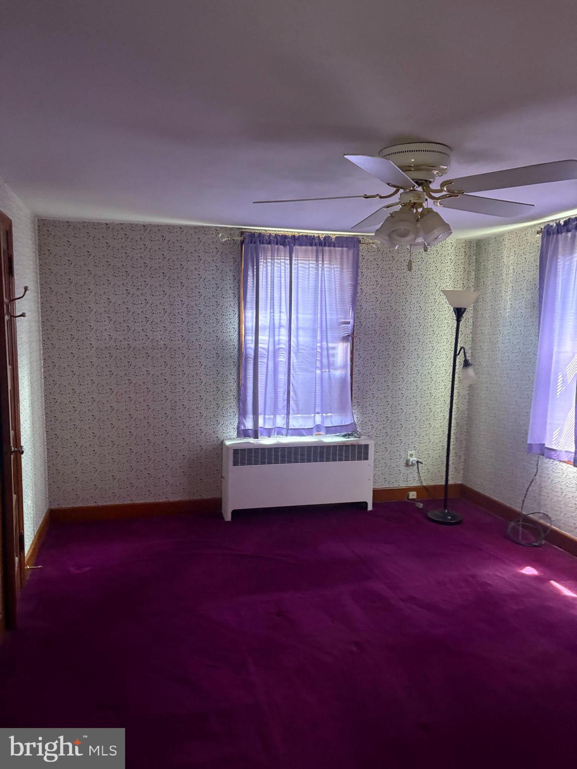 1500 Broadway Bethlehem, PA 18015 - Photo 32 of 43 an empty room with windows and a fireplace