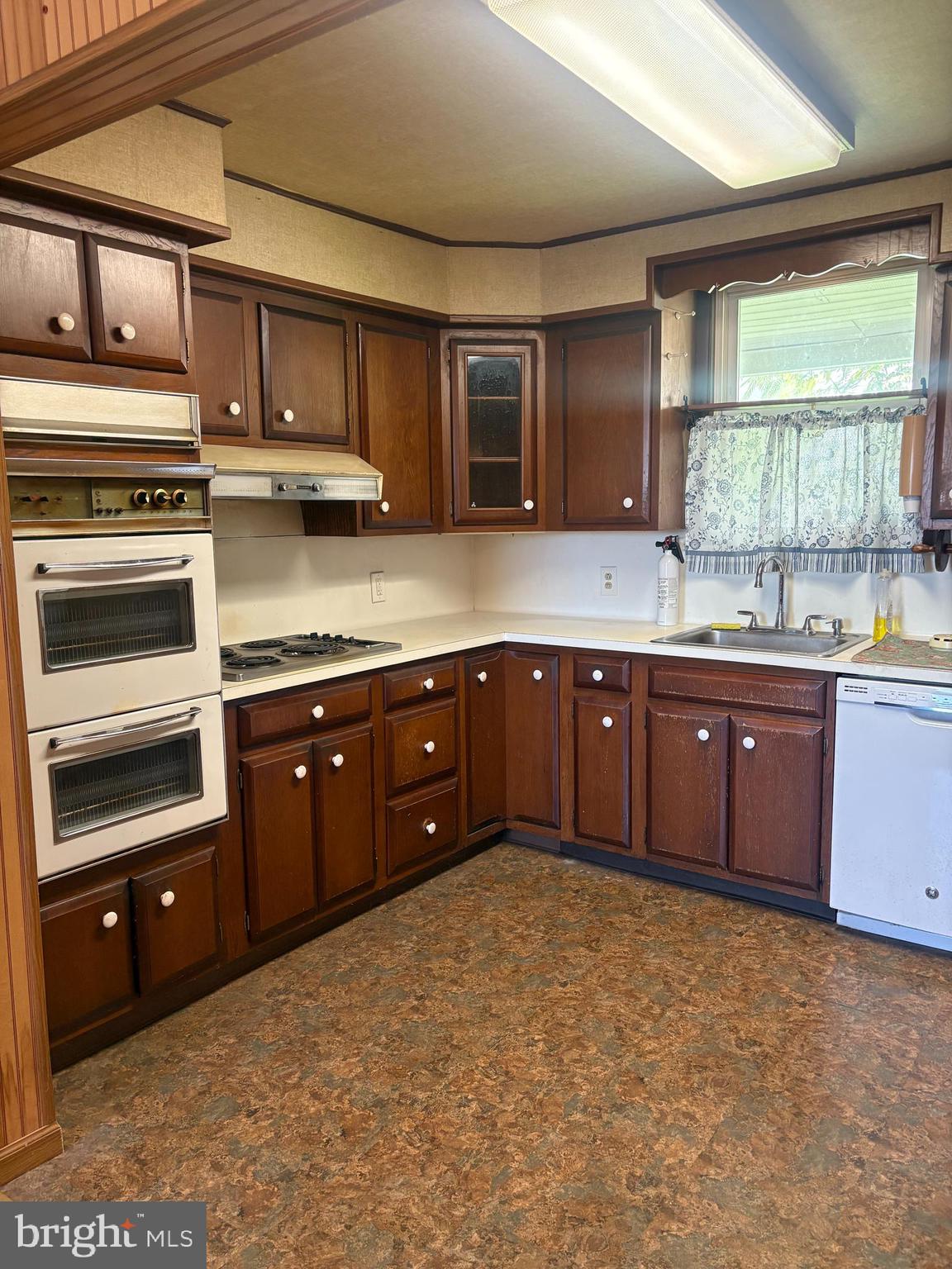 1500 Broadway Bethlehem, PA 18015 - Photo 38 of 43 a kitchen with a sink and cabinets