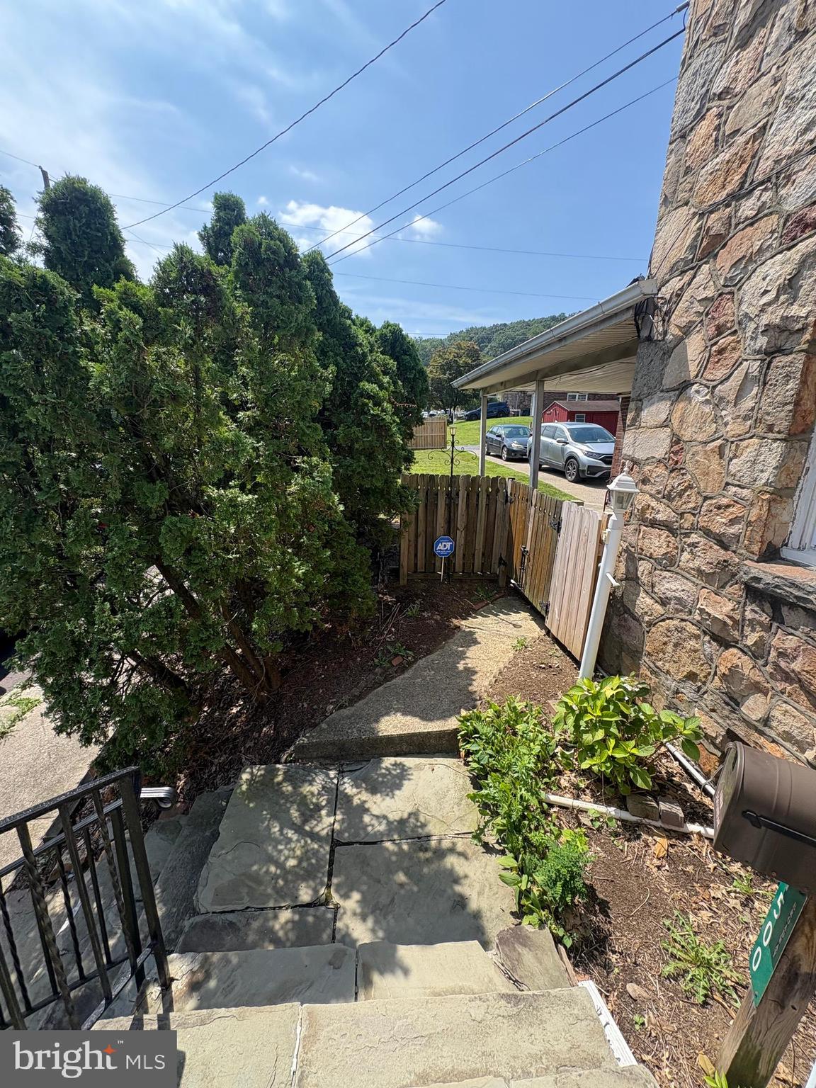 1500 Broadway Bethlehem, PA 18015 - Photo 6 of 43 a view of a patio with table and chairs with wooden fence and plants