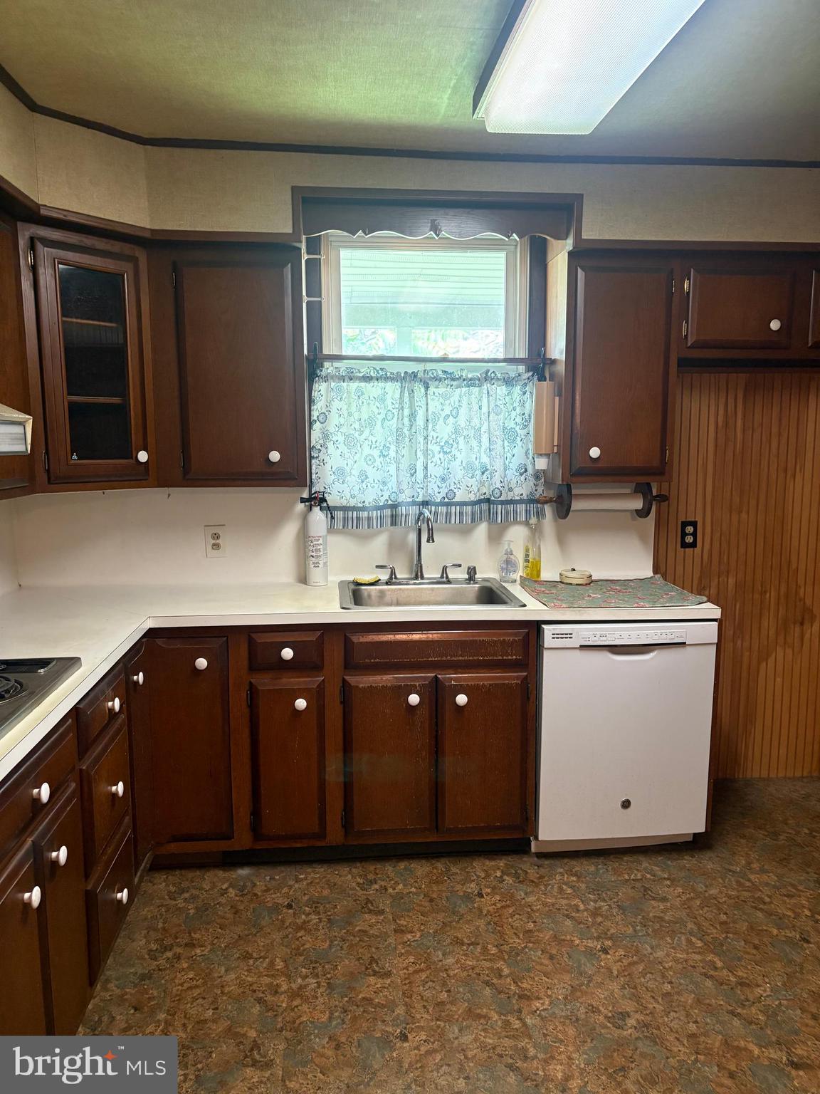1500 Broadway Bethlehem, PA 18015 - Photo 10 of 43 a kitchen with a sink window and cabinets