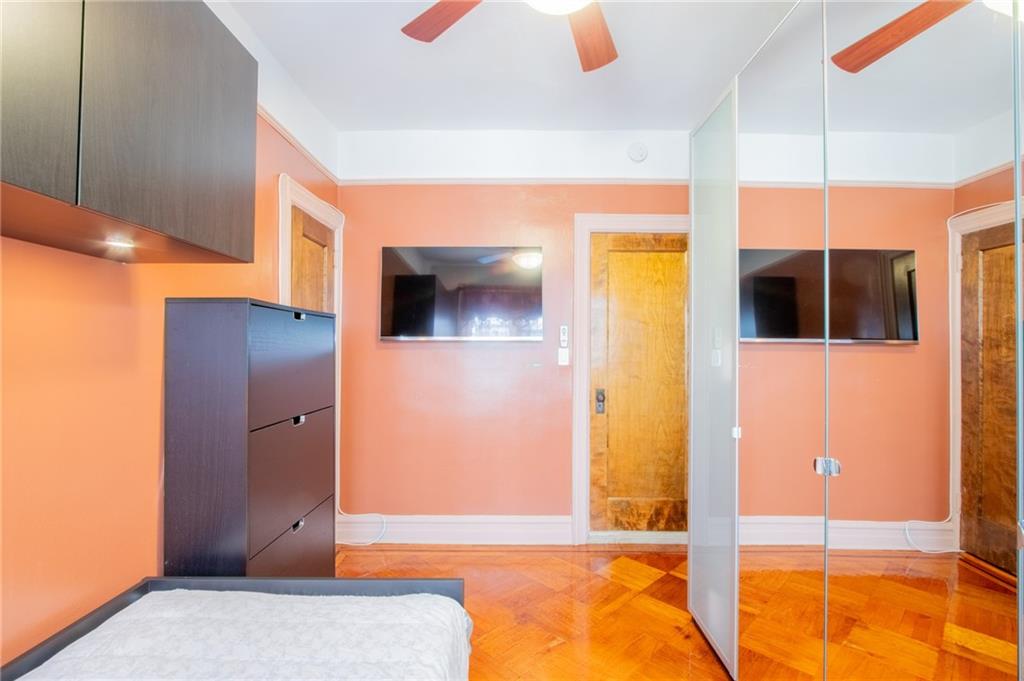 136 Bay Ridge Avenue Brooklyn, NY 11220 - Photo 12 of 48 a view of a hallway with wooden floor