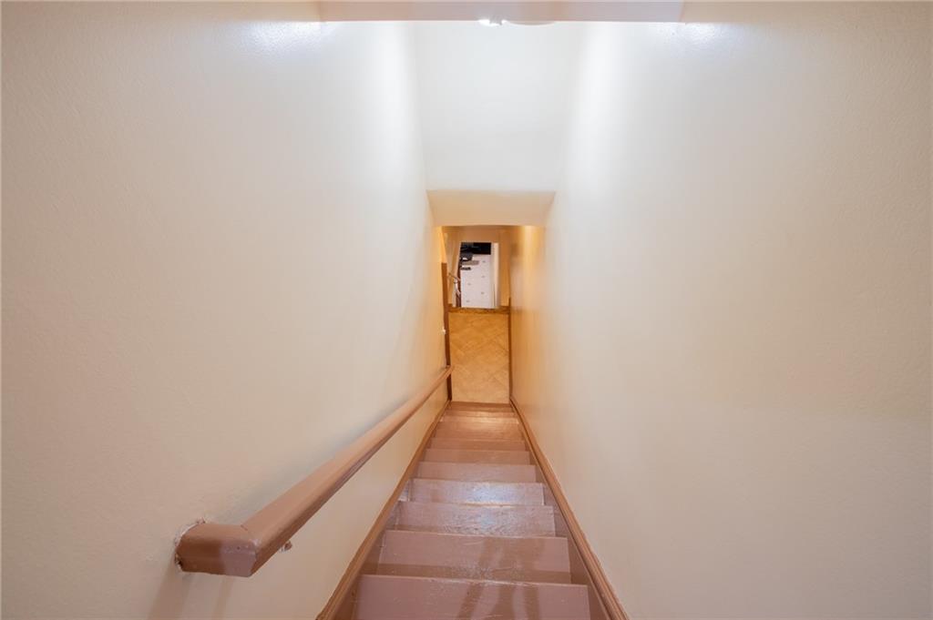 136 Bay Ridge Avenue Brooklyn, NY 11220 - Photo 22 of 48 a view of a hallway with wooden floor