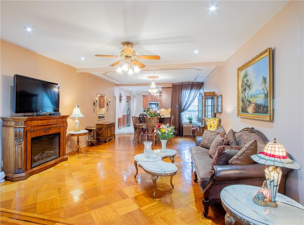 136 Bay Ridge Avenue Brooklyn, NY 11220 - Photo 27 of 48 a living room with furniture and a flat screen tv
